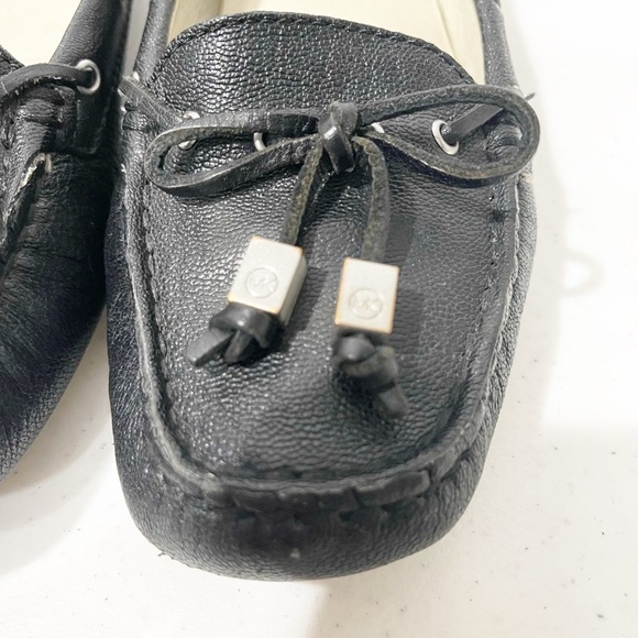 Michael Kors Amber Black pebbled tassel flats. - Picture 11 of 13